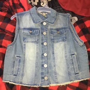 A jean vest only worn once and it didn’t fit me
